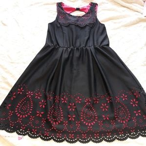 Black and pink lining dress.